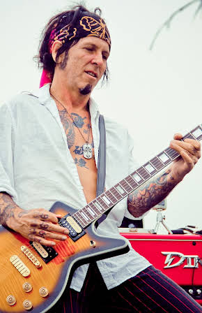 Tracii Guns as 