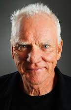 Malcolm McDowell como 