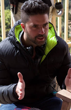 Carlos Algara as Director