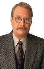 Martin Mull como Justin Gregory