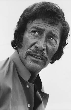 Peter Wyngarde as 