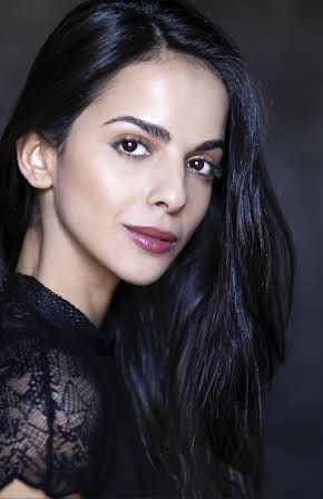 Shani Atias as 