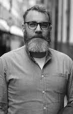 Adam Luria as Director