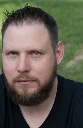 Thomas Hennessy as Director