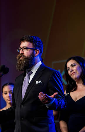 John K.D. Graham as Director