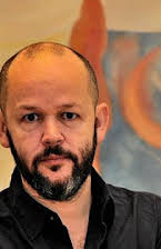 Gilles Marchand as Director