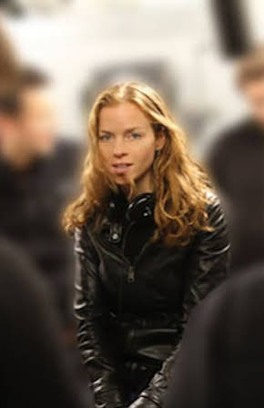 Claire Scanlon as Director