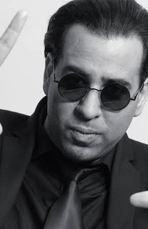 Usher Morgan as Director