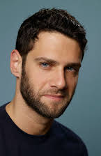 Justin Bartha as 
