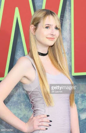 Zoe McLane as 