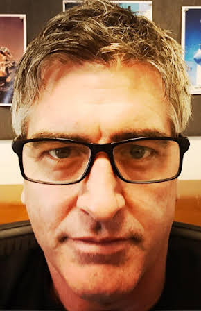 Jonathon E. Stewart as Director