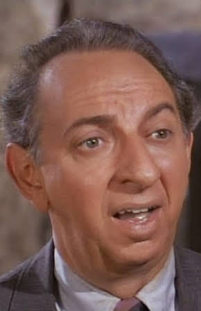 Phil Leeds as Dr. Shand