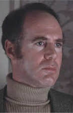 Barton Heyman como Det. Martin