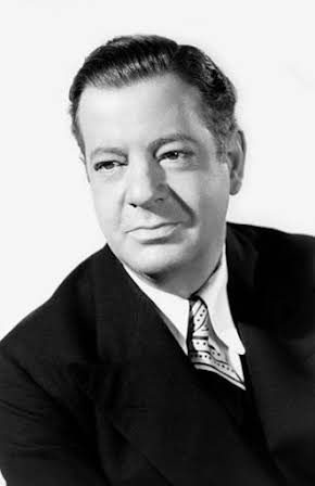 Alan Dinehart as 