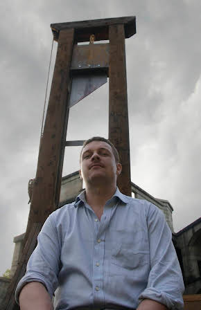 Glenn McQuaid as Director