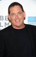 Mike Fleiss som Director