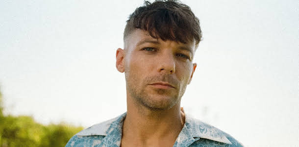 Louis Tomlinson Reflects on One Direction’s "What Makes You Beautiful"