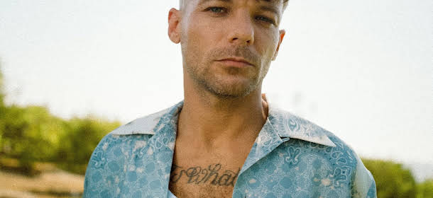 Louis Tomlinson Reflects on One Direction’s "What Makes You Beautiful"