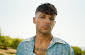 Louis Tomlinson Reflects on One Direction’s "What Makes You Beautiful"