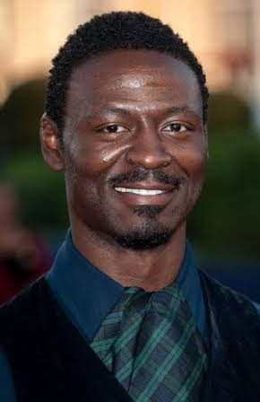Tishuan Scott as 
