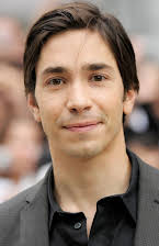 Justin Long como 