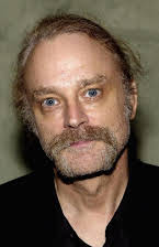 Brad Dourif som 