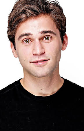 Jake Borelli as 
