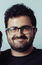 Rami Hachache som Director