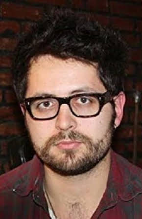 Maxim Pozdorovkin as Director