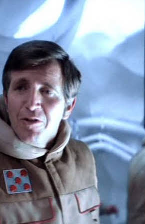 Bruce Boa as Poge Colonel