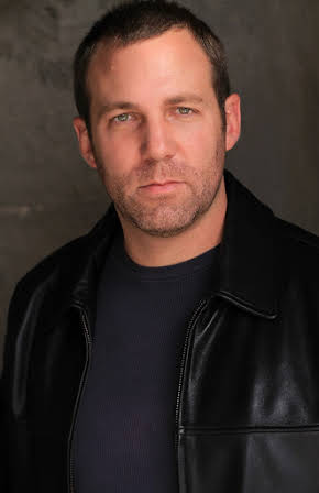 Chris Marks as Police Officer