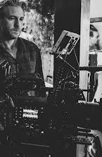 Desmond Devenish as Director