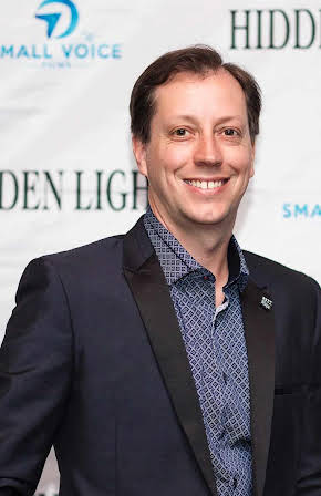 Aaron Kamp as Director