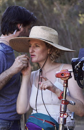 Amber Sealey as Director