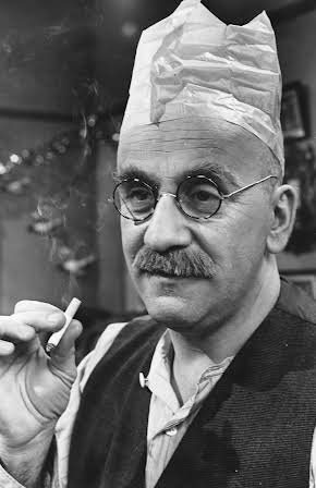 Warren Mitchell as 
