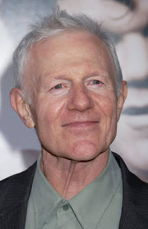 Raymond J. Barry as 