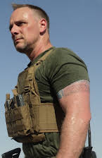 Brett Jones as Director