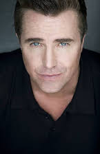 Paul McGillion as 