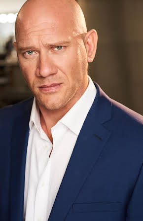 Mitchell L. Johnson as 