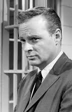 John Clarke as Director