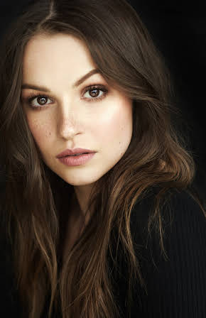 Kayla Wallace as 