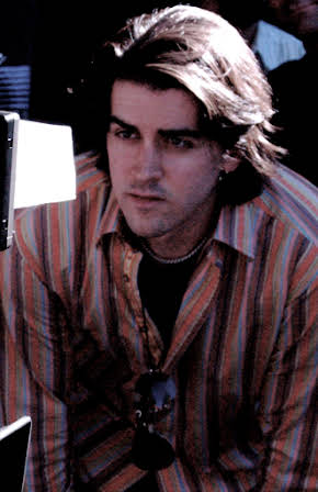 John Stewart Muller as Director