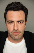 Reid Scott como 