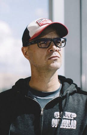 Travis Swartz as Director