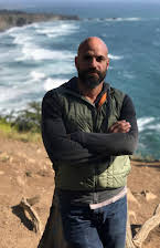 Juan Rendón som Director