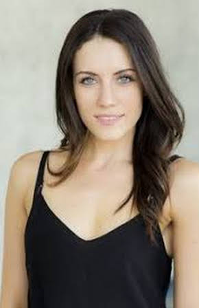 Laura Mitchell as 