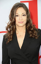 Erin Simms som Director