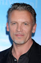 Callum Keith Rennie as 