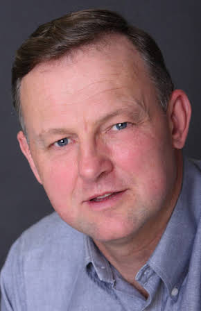 David J Biscoe as Police officer