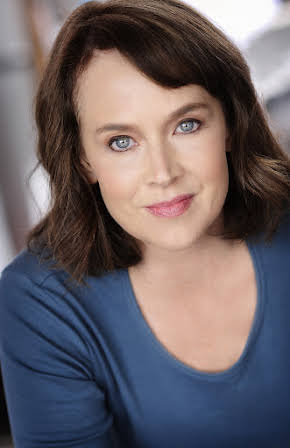 Laura Kirk as Flower Seller